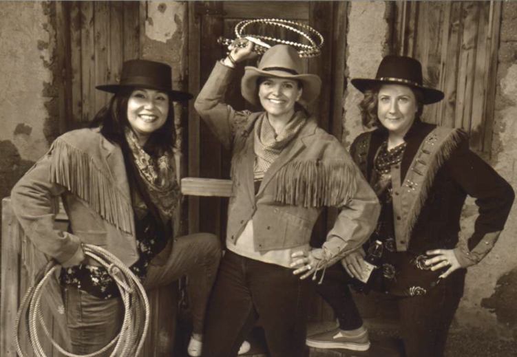 3 women in wild west attire